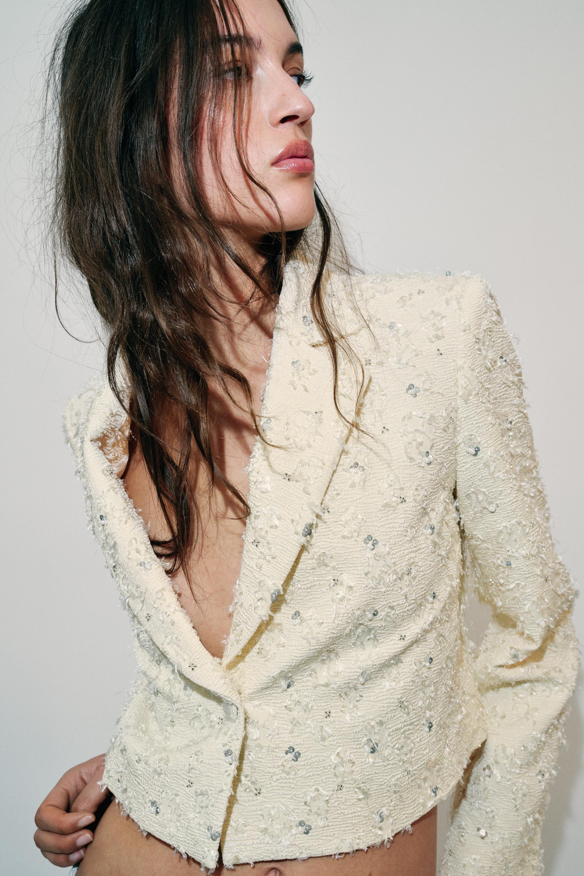 VESTE COURTE EFFRANGÉE À FANTAISIE